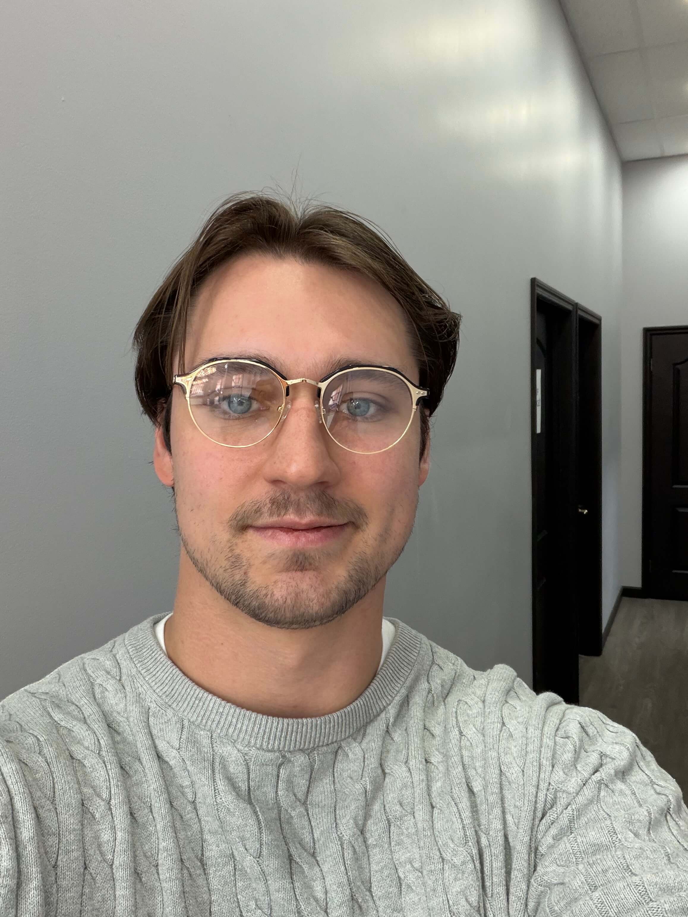 Daniel wearing Bowie Unisex Eyeglasses